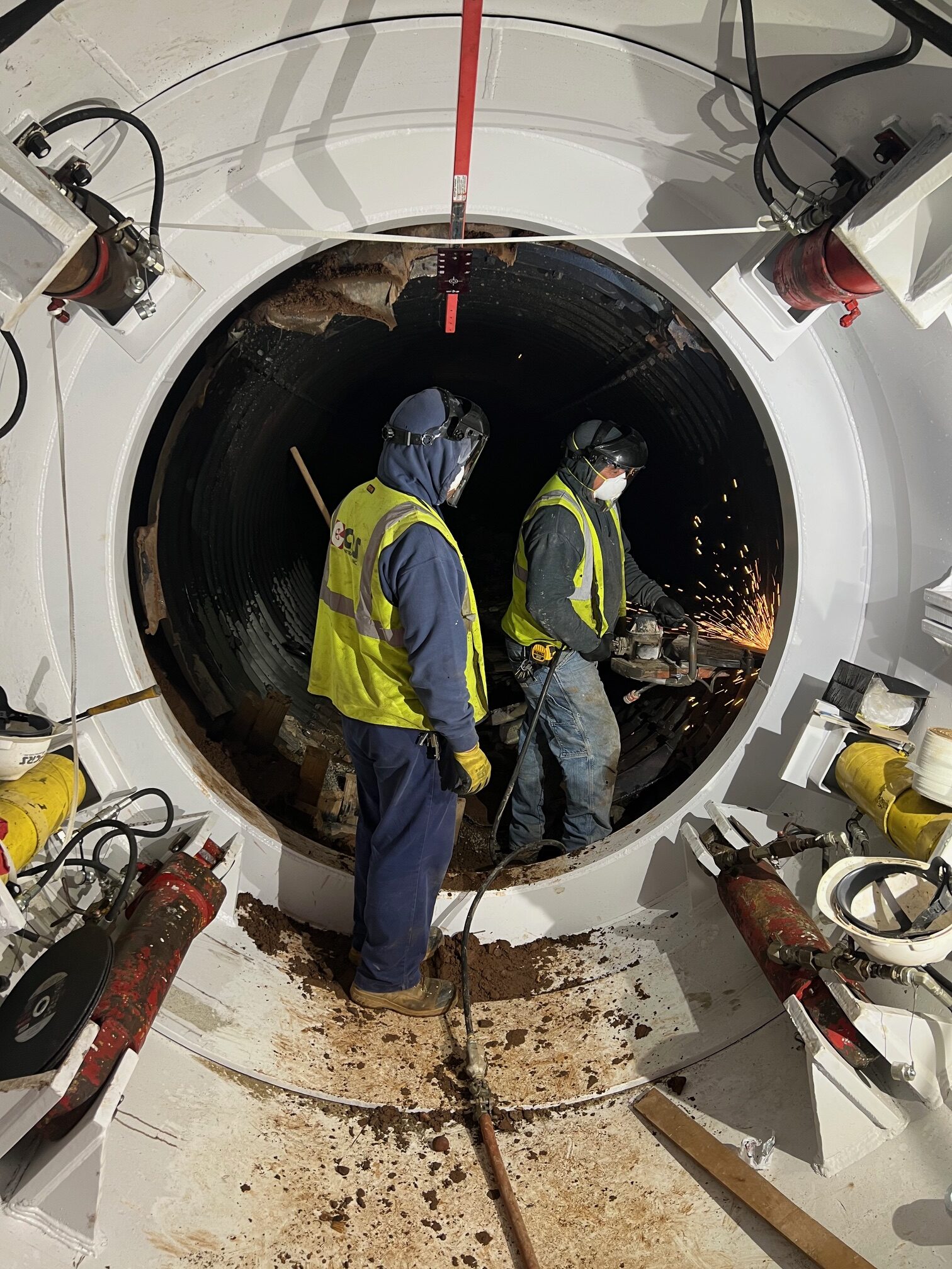 CRS Contractors crew performing microtunneling and underground infrastructure construction inside a utility tunnel
